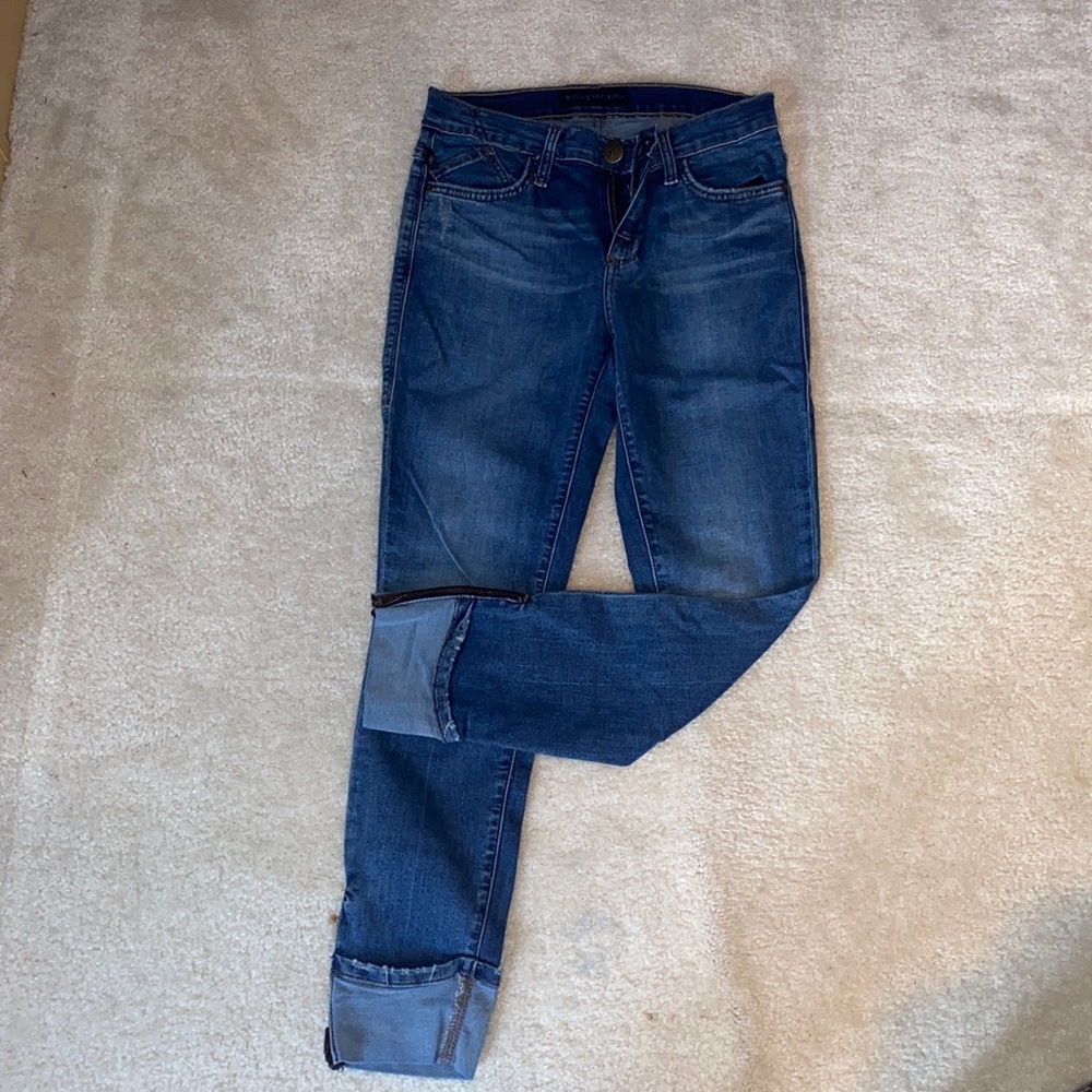 Rock & Republic skinny jeans with functioning zipper cuffs.